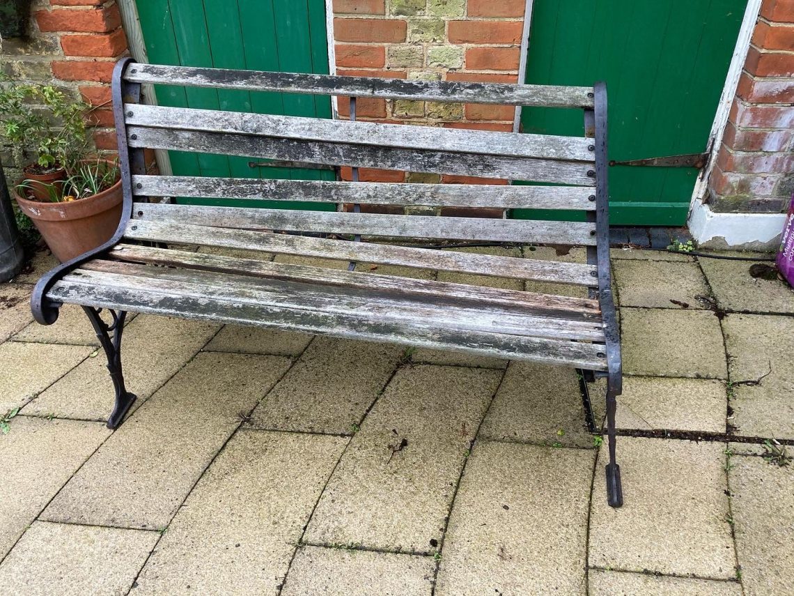 Before restoration. Rusted fixings that damaged adjacent timber. The slats had never been treated and the bolts had rusted to the bench ends.